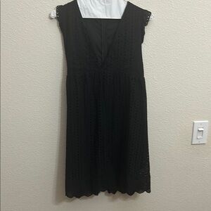 Black eyelet filly lined v-neck dress